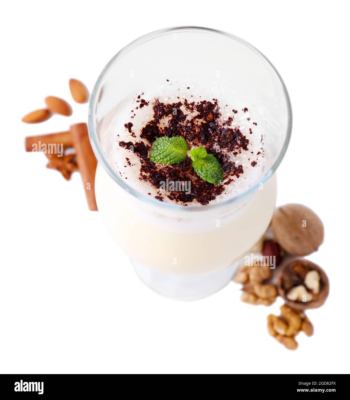 Eggnog with spices isolated on white Stock Photo Alamy