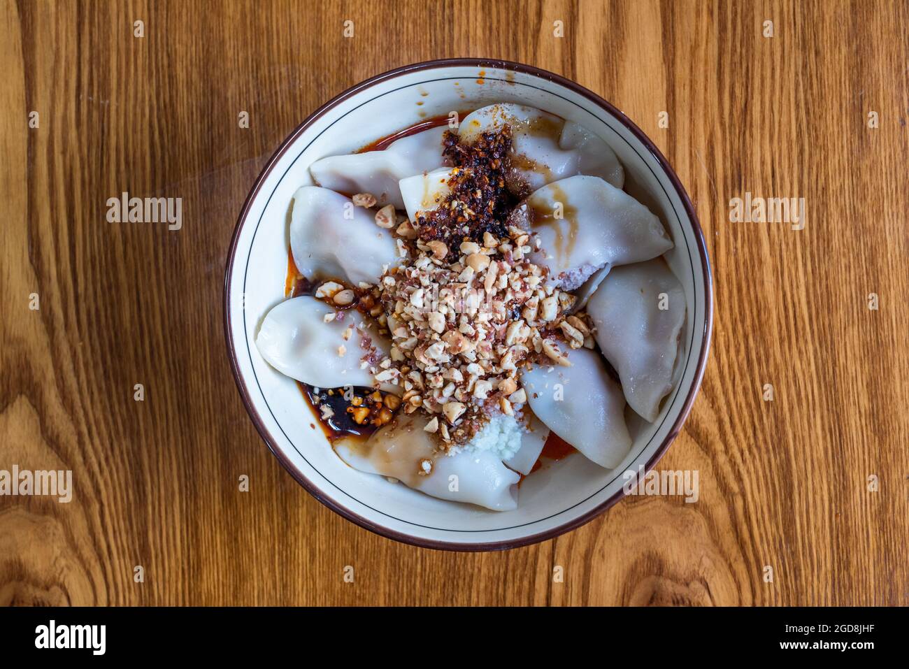 ZhongShuiJiao jiaozi steamed chinese dumplings with peanuts sauce on a