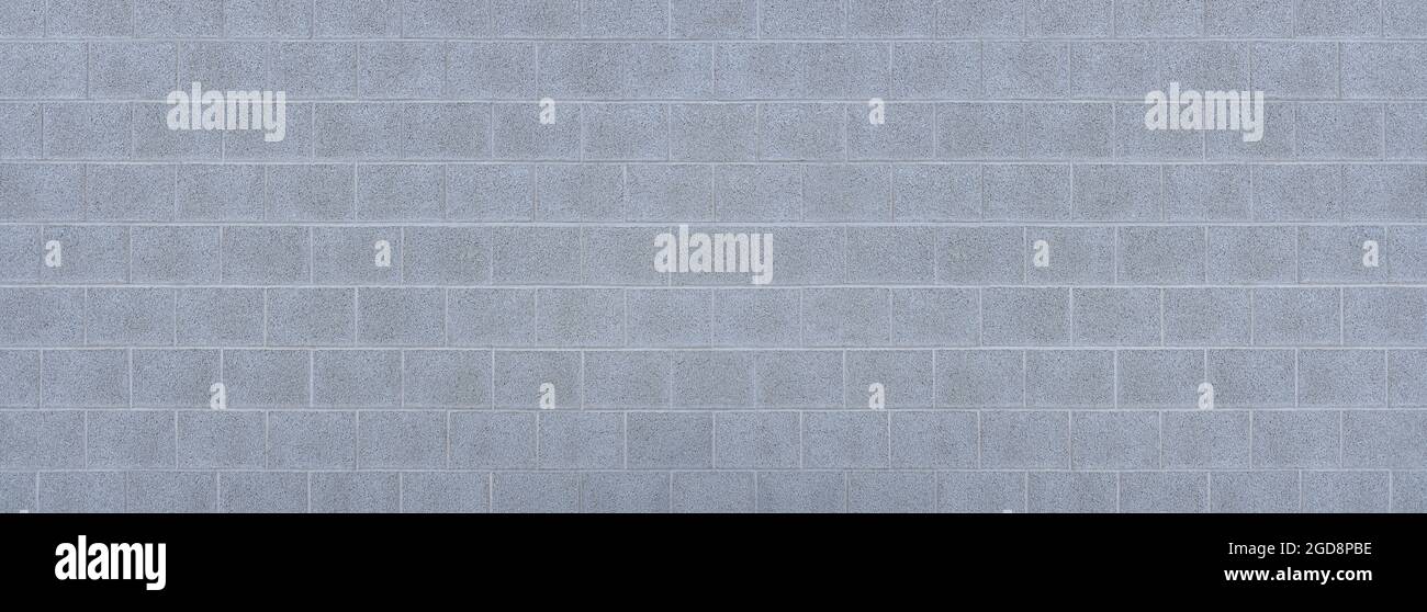 Light gray exterior wall made of square cement stones Stock Photo