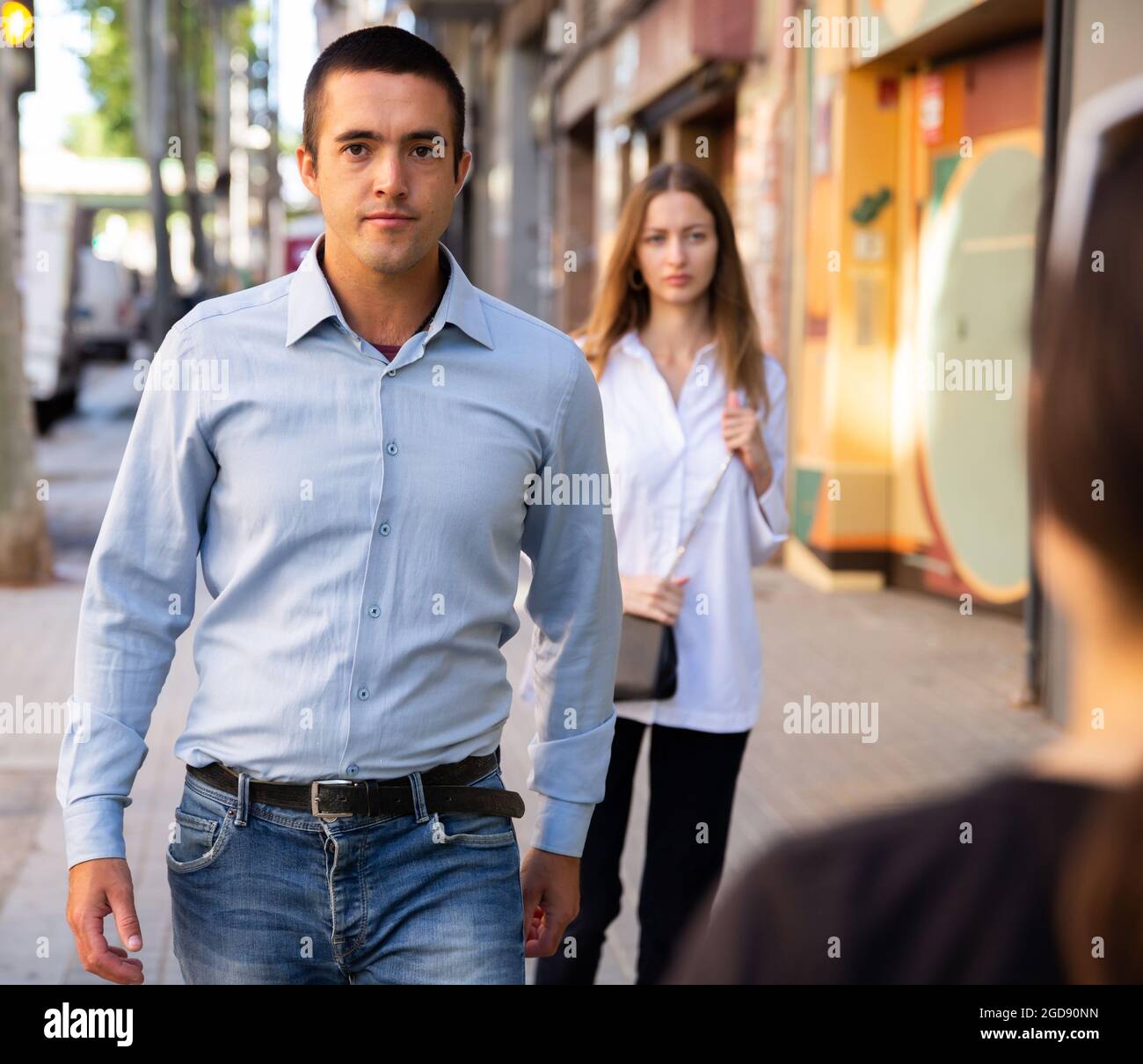 Young people walking on summer city streets Stock Photo - Alamy