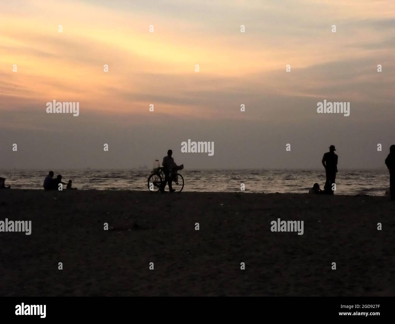 sunset on a beach Stock Photo - Alamy