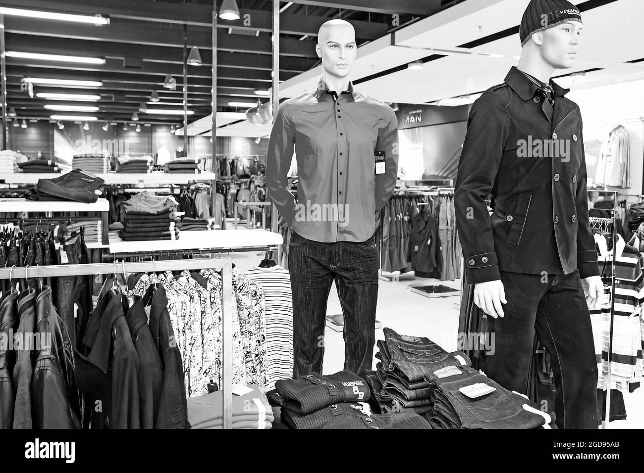 JOHANNESBURG, SOUTH AFRICA - Jan 06, 2021: A grayscale of apparel in Up-Market retail store in Johannesburg, South Africa Stock Photo