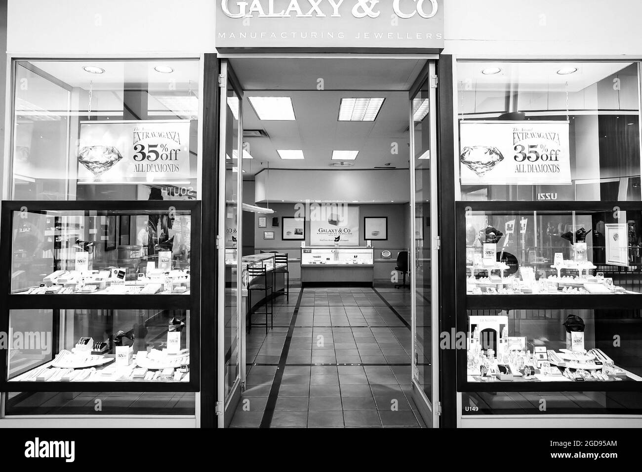 JOHANNESBURG, SOUTH AFRICA - Jan 06, 2021: A grayscale shot inside a diamond jewelry store in Johannesburg, South Africa Stock Photo