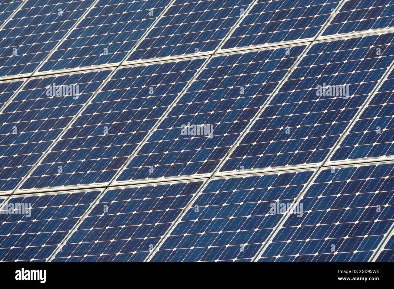 Closeup of solar cells mounted on a roof. Seen in Germany in July Stock Photo