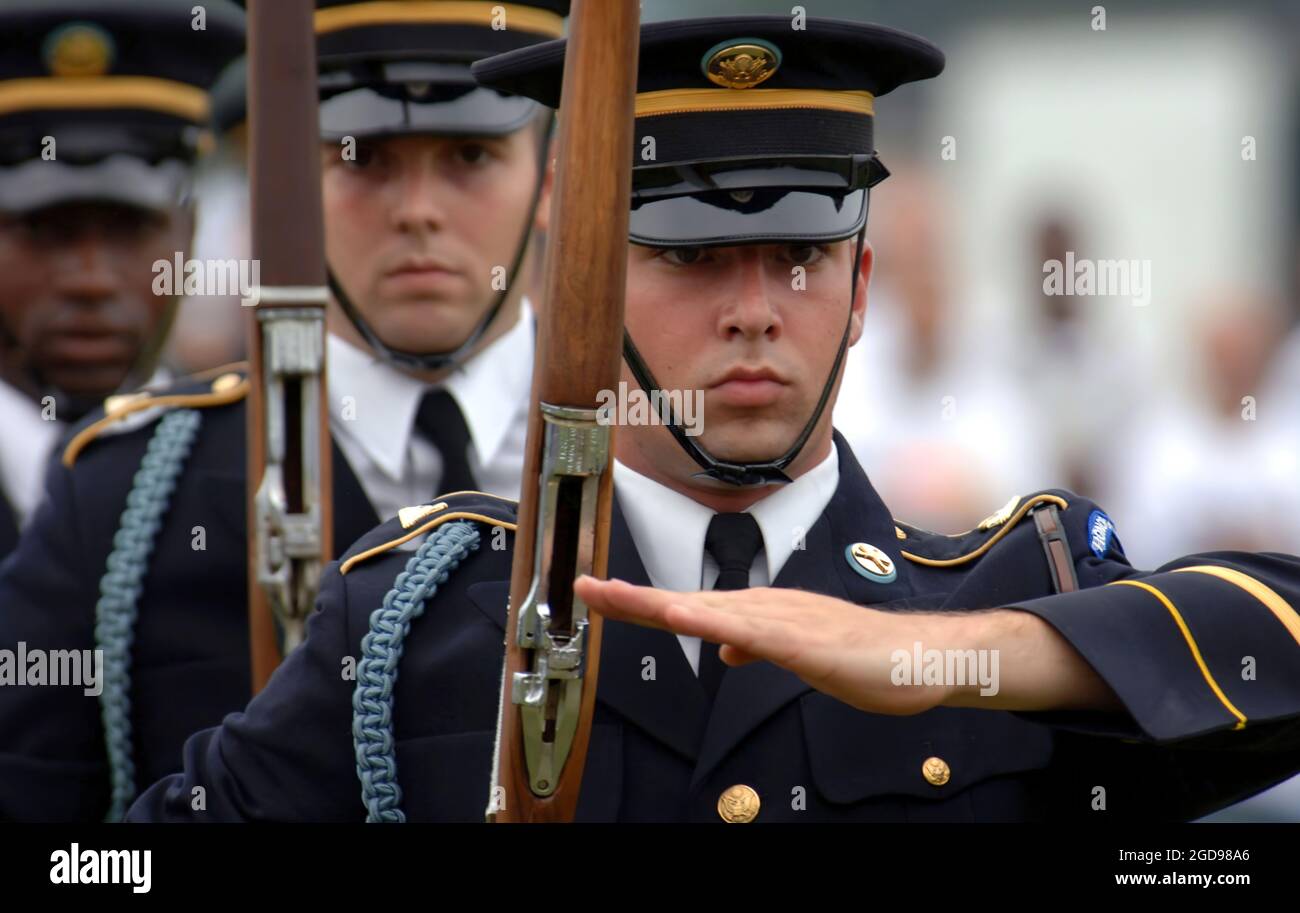 Members of the US Army (USA) 3rd Infantry Regiment (IR) (Old Guard) Drill Team perform their precision drill movements at the Fort Eustis, Virginia (VA), during 2006 Super Day festival. The Super Day festival is a chance to show appreciation to Soldiers, family, friends, and the civilian workforce in the Fort Eustis community.  (US NAVY PHOTO BY MC2(AW/SW) JUSTIN K. THOMAS 060811-N-5555T-002) Stock Photo