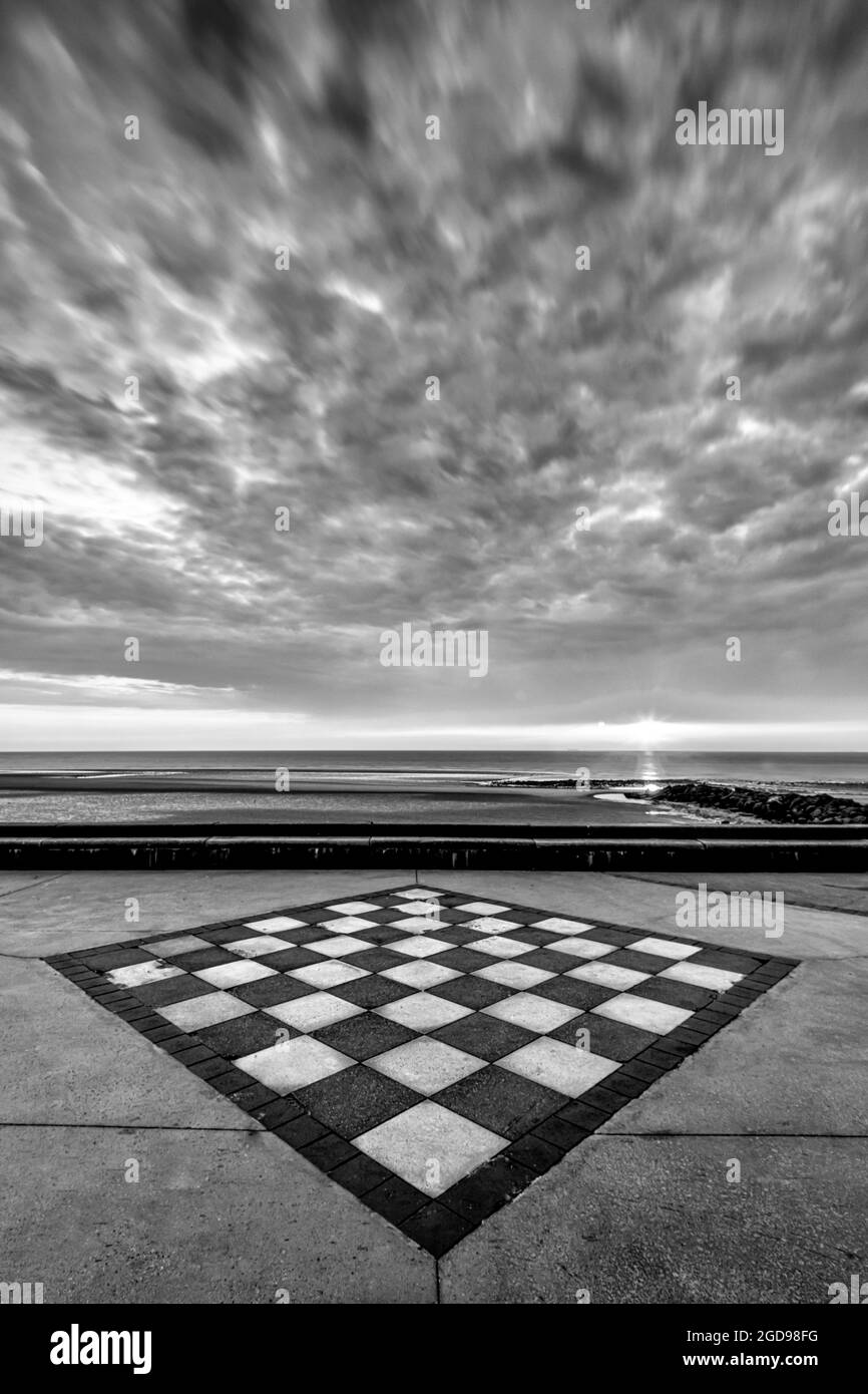 game of checkers facing the sea Stock Photo