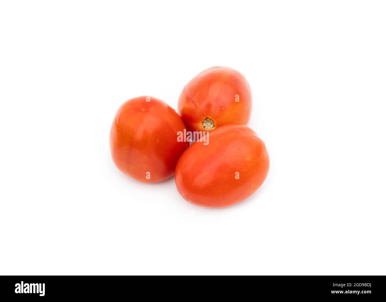 Three organic ripe tomatoes on an isolated white background Stock Photo ...