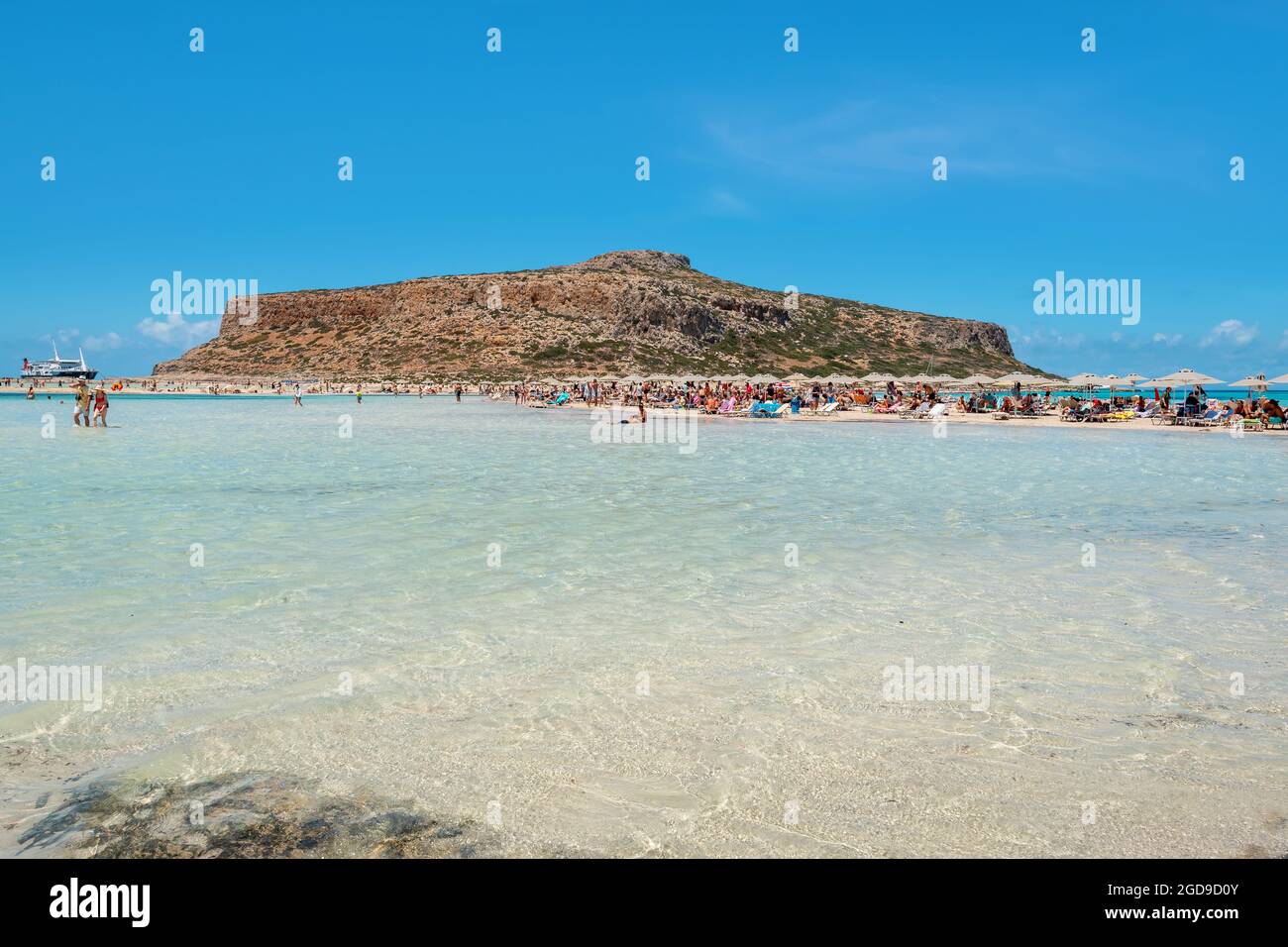 Holidaymakers sunbathing on picturesque Balos beach. Crete, Greece Stock Photo