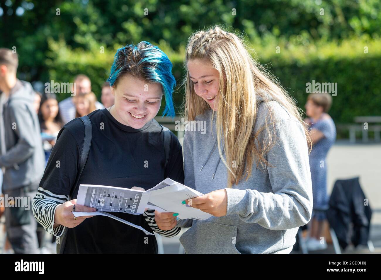 Bromsgrove, Worcs, UK. 12th Aug, 2021. Students Erin Williams and Bella Pendlebury open their GCSE results at North Bromsgrove High School, Bromsgrove, Worcs. Credit: Peter Lopeman/Alamy Live News Stock Photo
