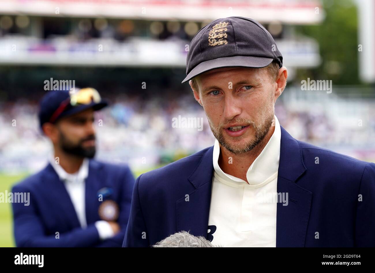 England captain Joe Root is interviewed alongside India captain Virat Kohli  (background) before the start of play on day one of the cinch Second Test  match at Lord's, London. Picture date: Thursday