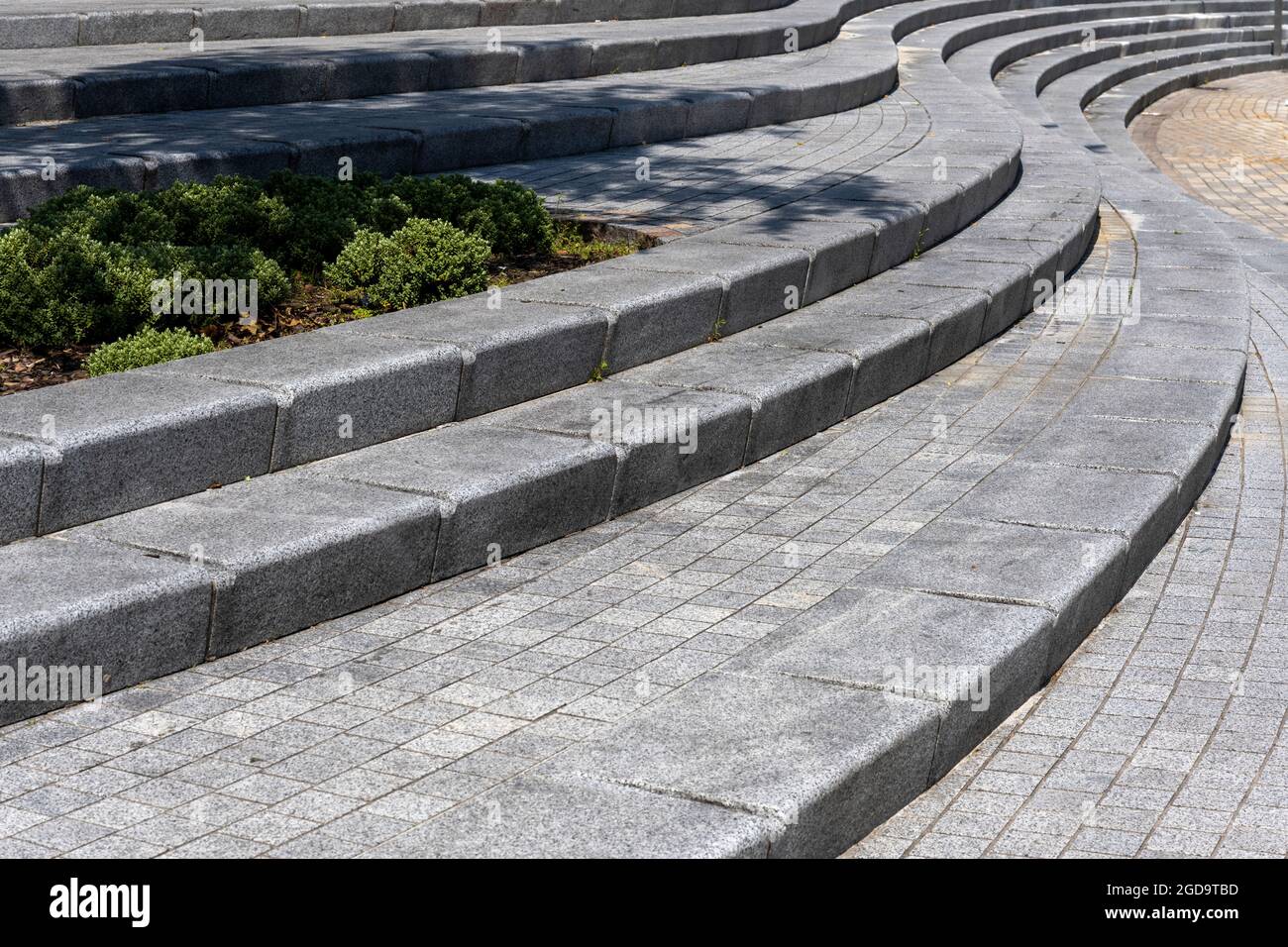 Sweeping lines of grey paving slabs laid out as steps at Southampton