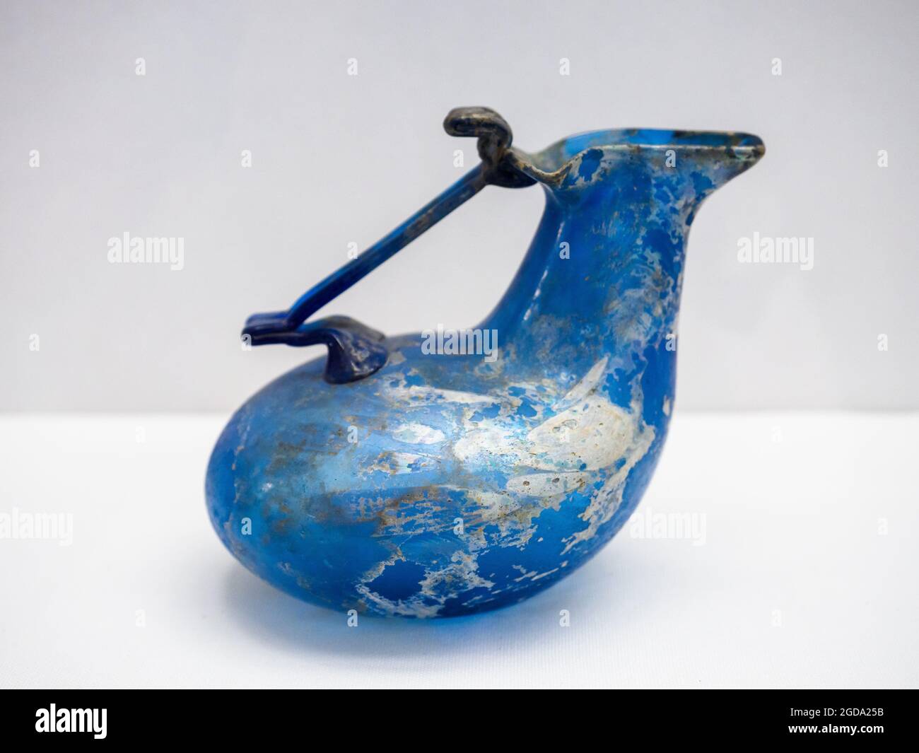 Askos (vessel for pouring oils) - free- blown blue glass from Pompeii - 1st century AD Stock Photo