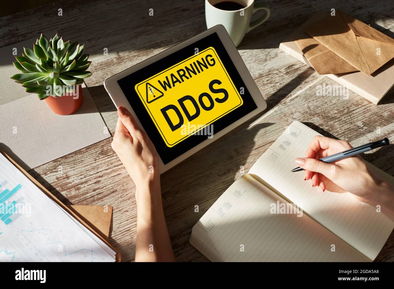 DDoS attack detection message. Virus and Hacking. Cyber security and internet concept. Stock Photo