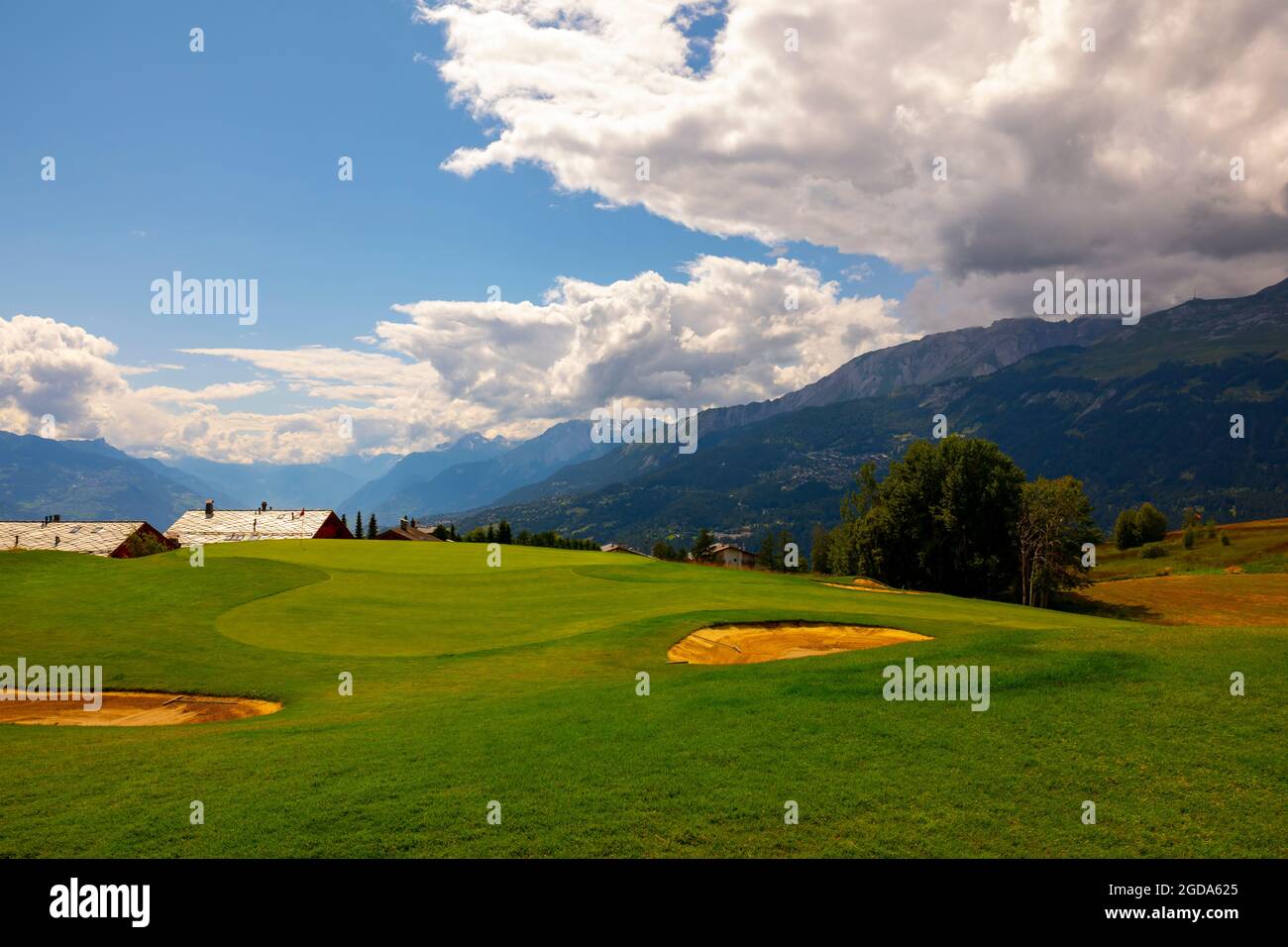 Crans Sur Sierre Golf Course with Hole 7 and Mountain View in Crans Montana  in Valais, Switzerland Stock Photo - Alamy