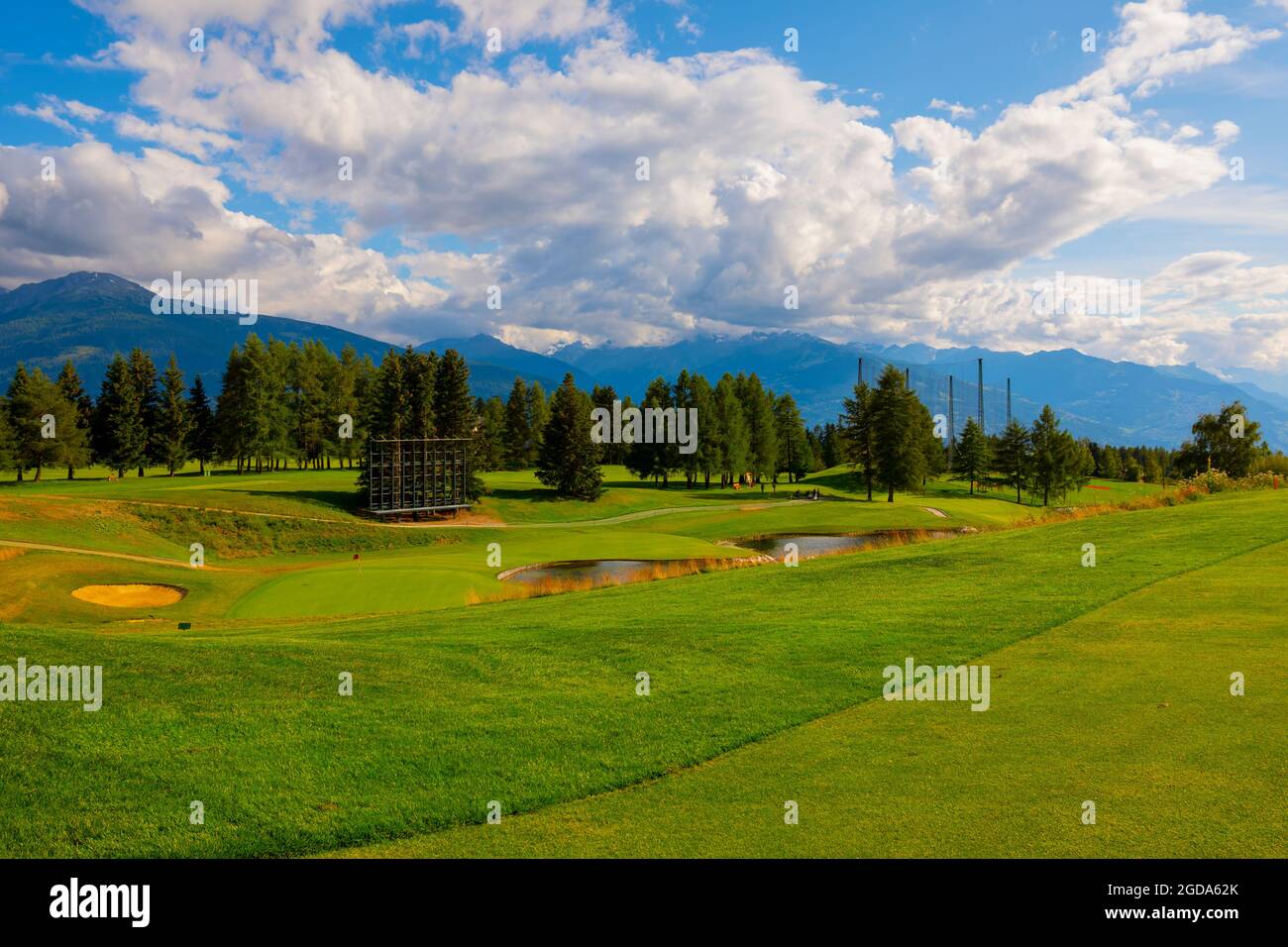 Crans Sur Sierre Golf Course and Mountain View in Crans Montana in Valais,  Switzerland Stock Photo - Alamy