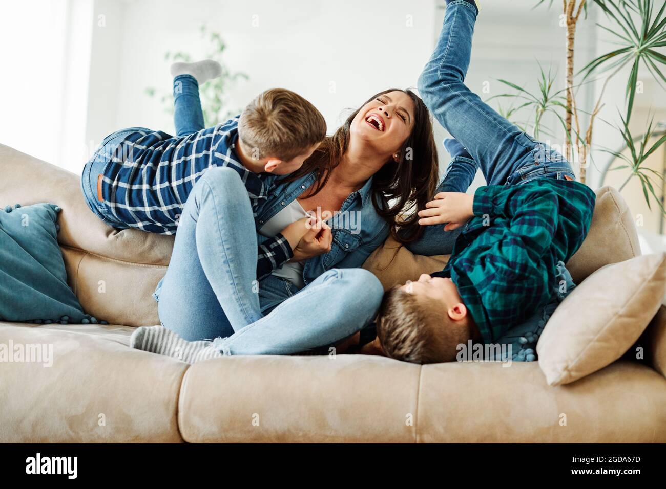 child son mother family happy playing kid childhood Stock Photo