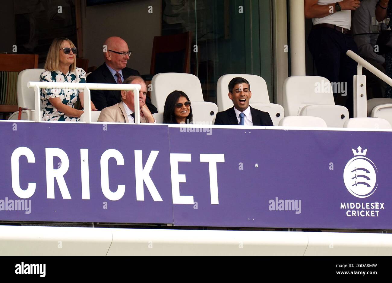 Chancellor of the Exchequer Rishi Sunak (front right) alongside his wife Akshata Murthy in the stands during day one of the cinch Second Test match at Lord's, London. Picture date: Thursday August 12, 2021. Stock Photo