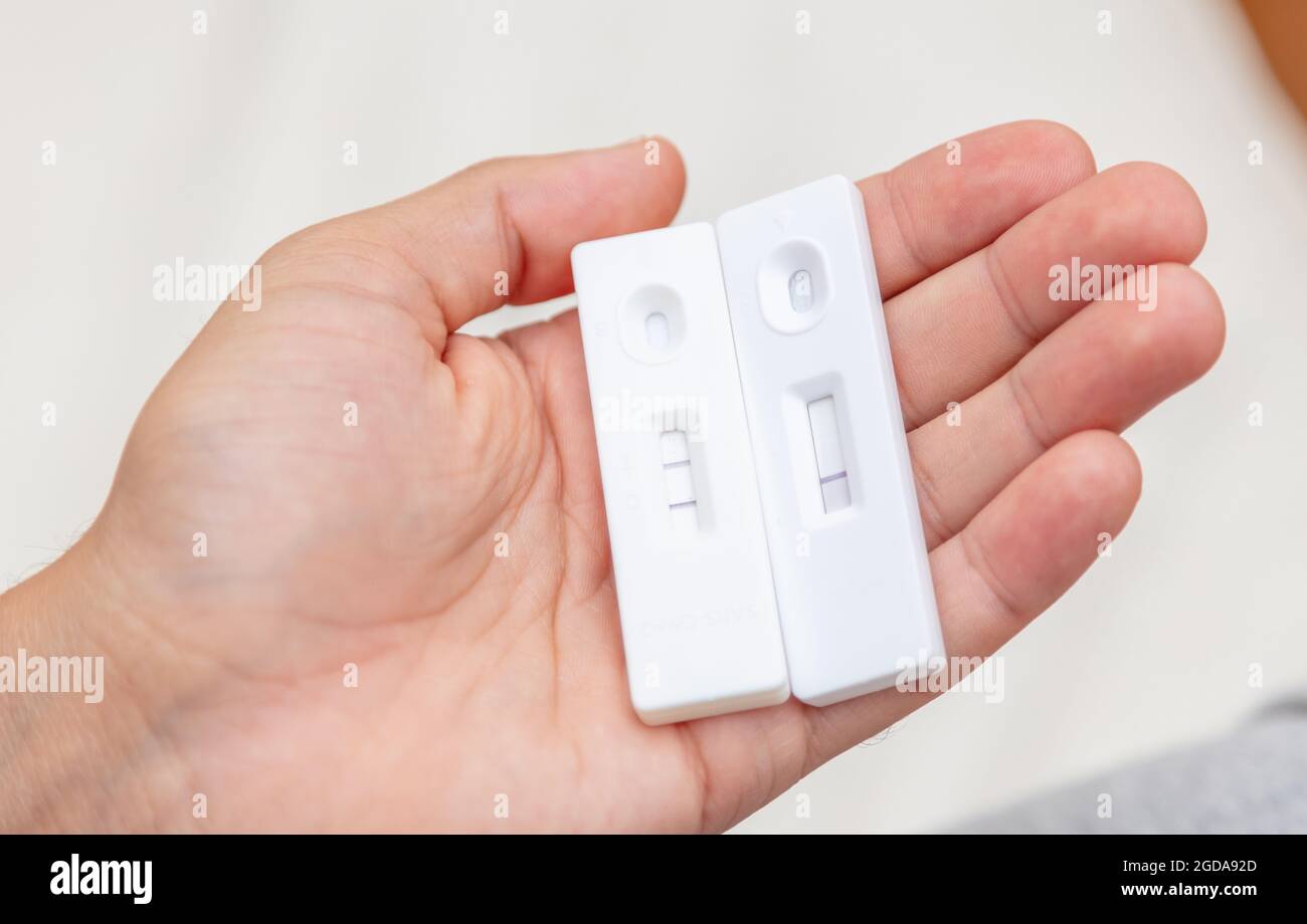 Positive rapid antigen detection test hires stock photography and