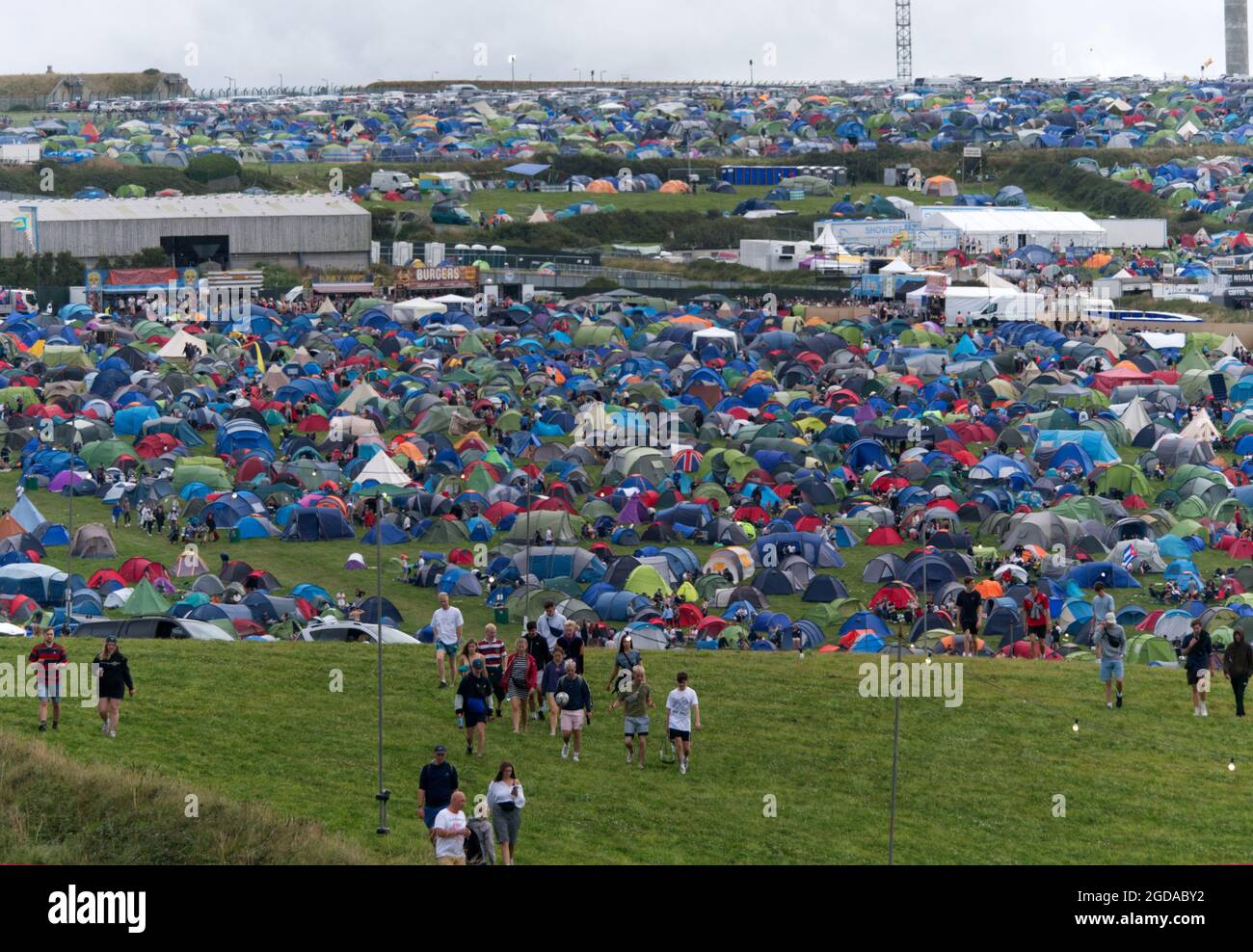 Newquay, Cornwall. 12:00 hours. The Boardmasters 2021 Music and surf festival near Watergate Bay. A Tent and Tipi village created on adjacent farmland to accommadate the tens of thousands expected. Foals Gorillaz and Jorja Smith headline. the Kooks.Also Loyle Carner, Jaie xx, Lianne La Havas an  12th August 2021. Credit: Robert Taylor/Alamy Live News Stock Photo