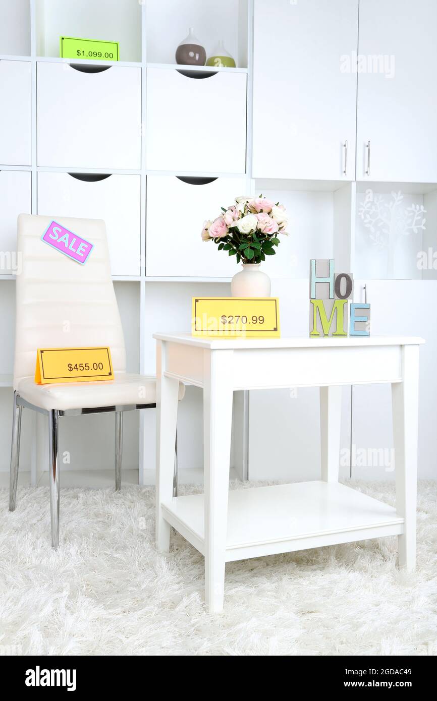 New white furniture with prices Stock Photo Alamy