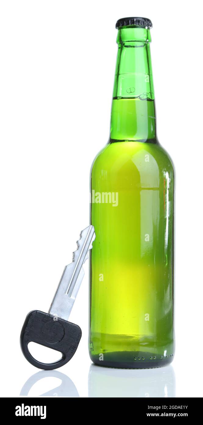 Composition with car key and bottle of beer, isolated on white Stock