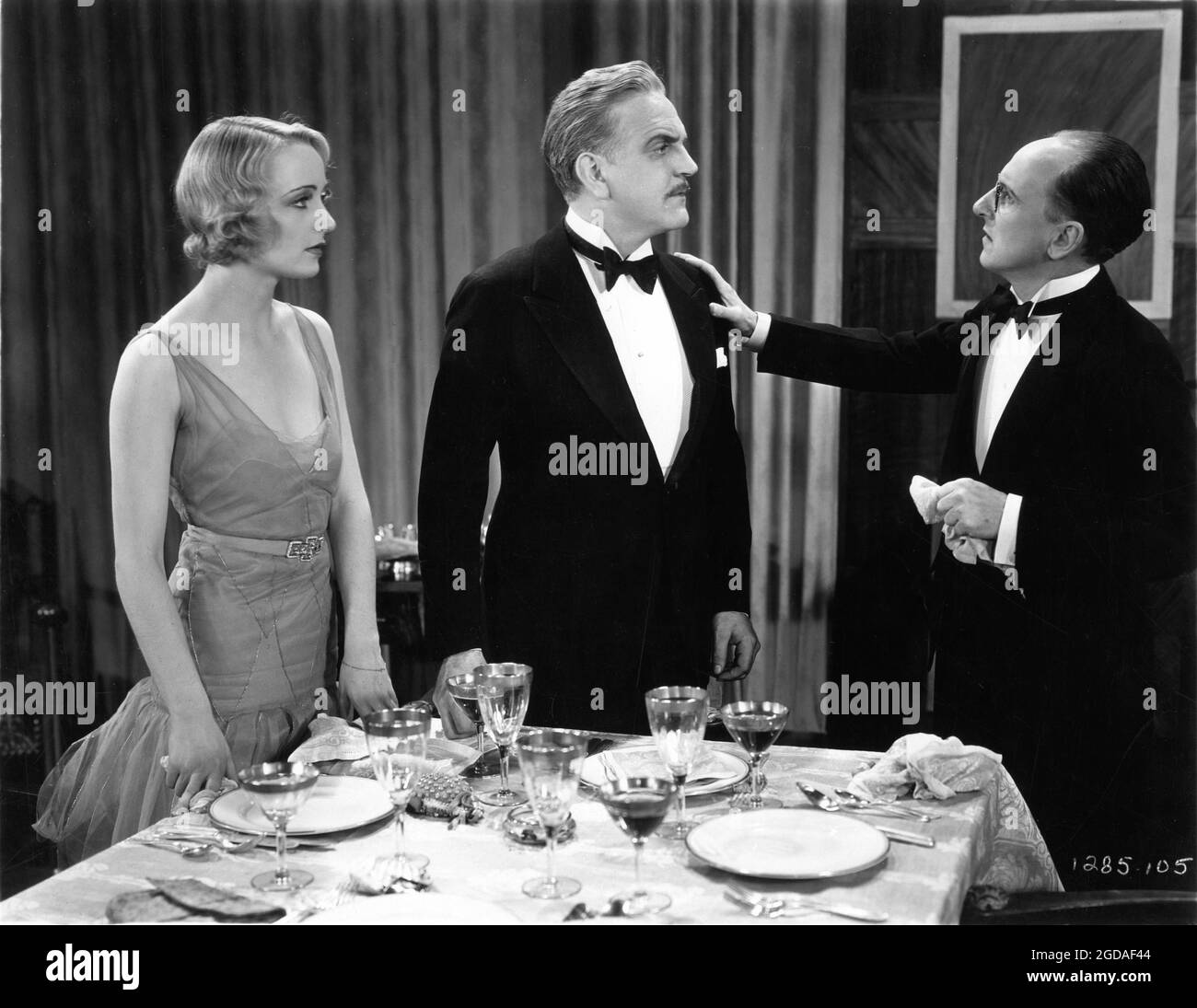 CAROLE LOMBARD FRANK MORGAN and BARRY O'MOORE in FAST AND LOOSE 1930 director FRED C. NEWMEYER story Doris Anderson and Jack Kirkland play The Best People by David Gray and Avery Hopwood dialogue Preston Sturges costume design Travis Banton Paramount Pictures Stock Photo