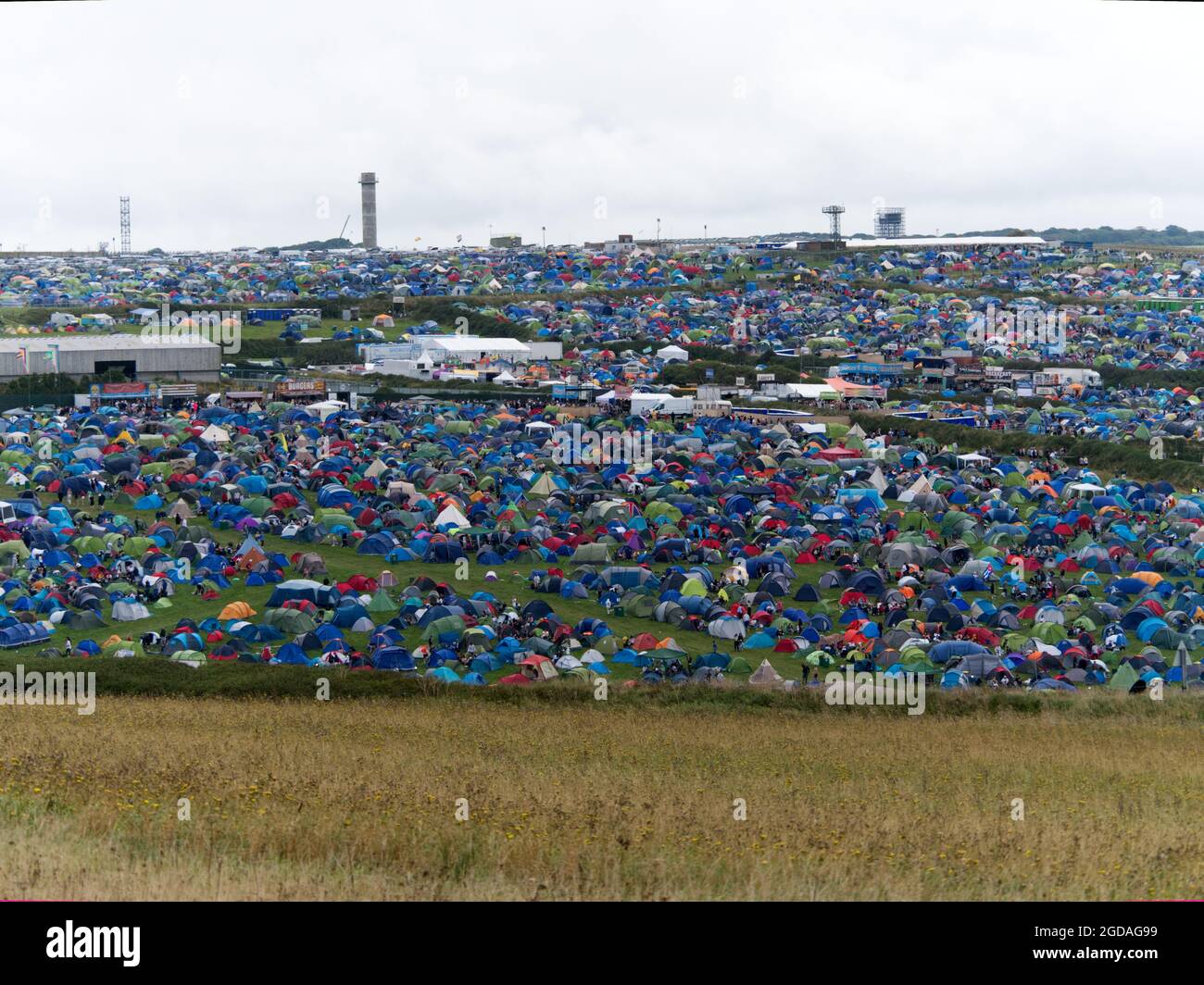 Newquay, Cornwall. 12:00 hours. The Boardmasters 2021 Music and surf festival near Watergate Bay. A Tent and Tipi village created on adjacent farmland to accommadate the tens of thousands expected. Foals Gorillaz and Jorja Smith headline. the Kooks.Also Loyle Carner, Jaie xx, Lianne La Havas an  12th August 2021. Credit: Robert Taylor/Alamy Live News Stock Photo