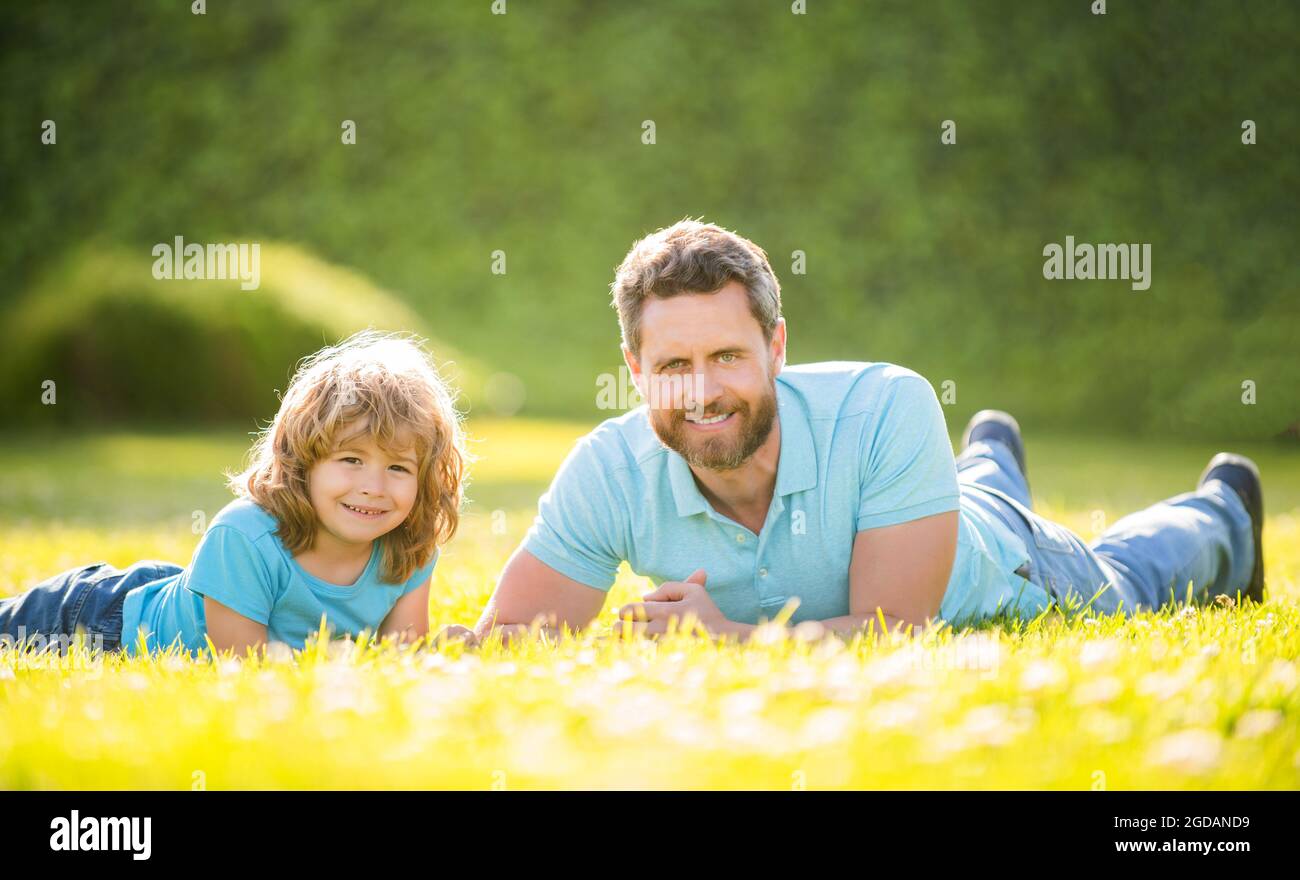 fathers day. happy father and son having fun in park. family value. childhood and parenthood. Stock Photo