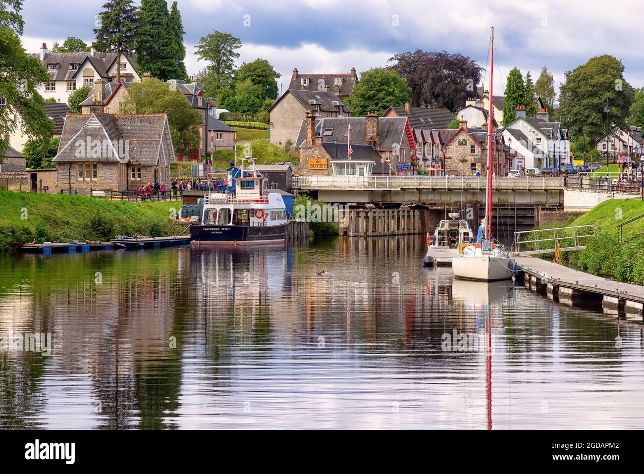 Fort Augustus, United Kingdom - August 19, 2014: The Caledonian canal at the Loch Ness lake. The Canal connects the Scottish east coast at Inverness Stock Photo