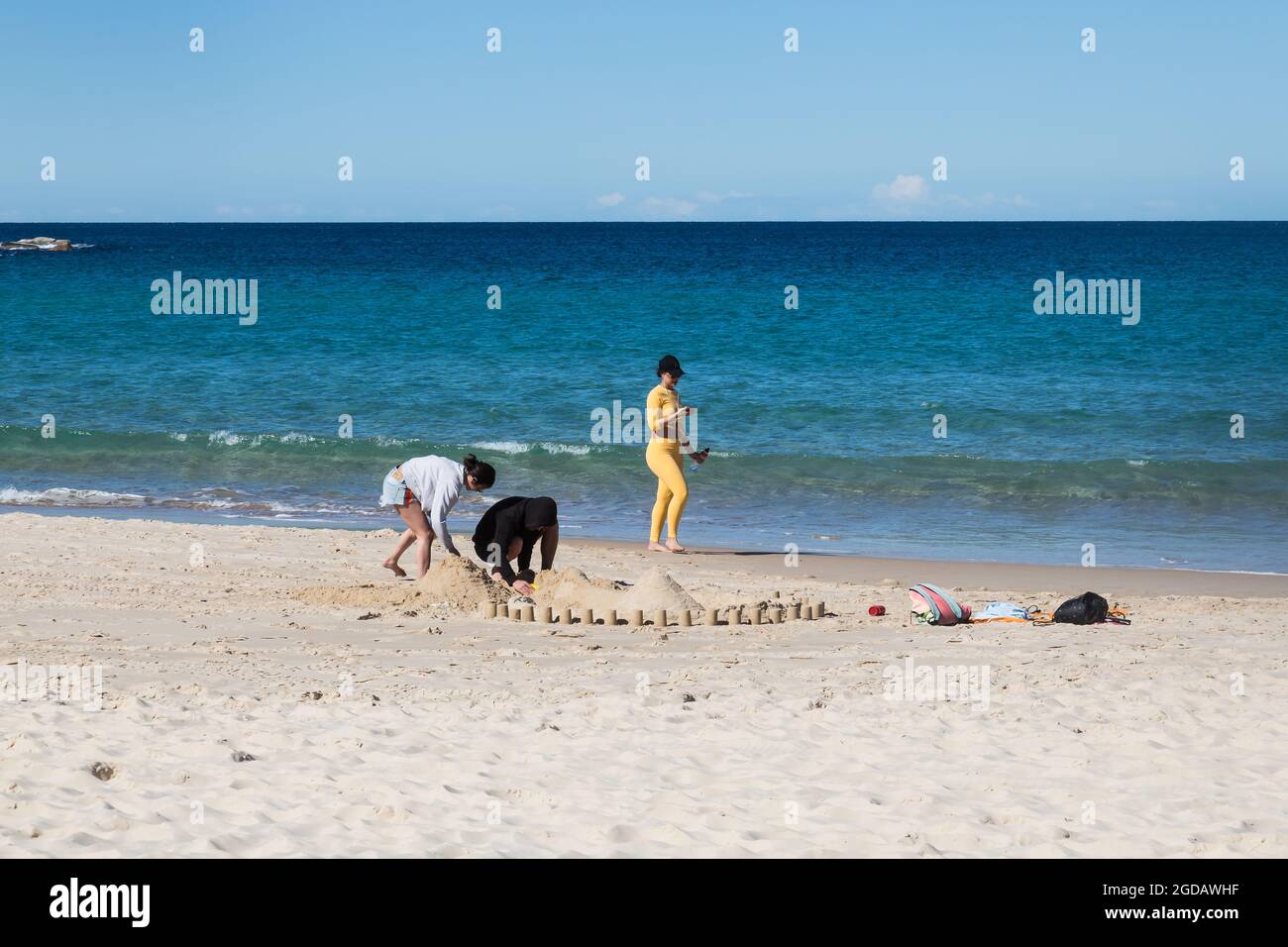 Sydney, Australia. Thursday 12th August 2021. Locals exercising and enjoying a beautiful winters day with a maximum temperature around 22 ºC at Bondi Beach. Lockdown restrictions for parts of  greater Sydney have been further extended due to the Delta Variant spreading. Credit: Paul Lovelace/Alamy Live News Stock Photo