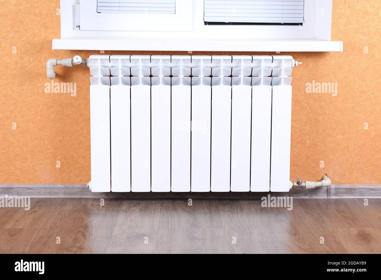 Heating radiator in room Stock Photo Alamy