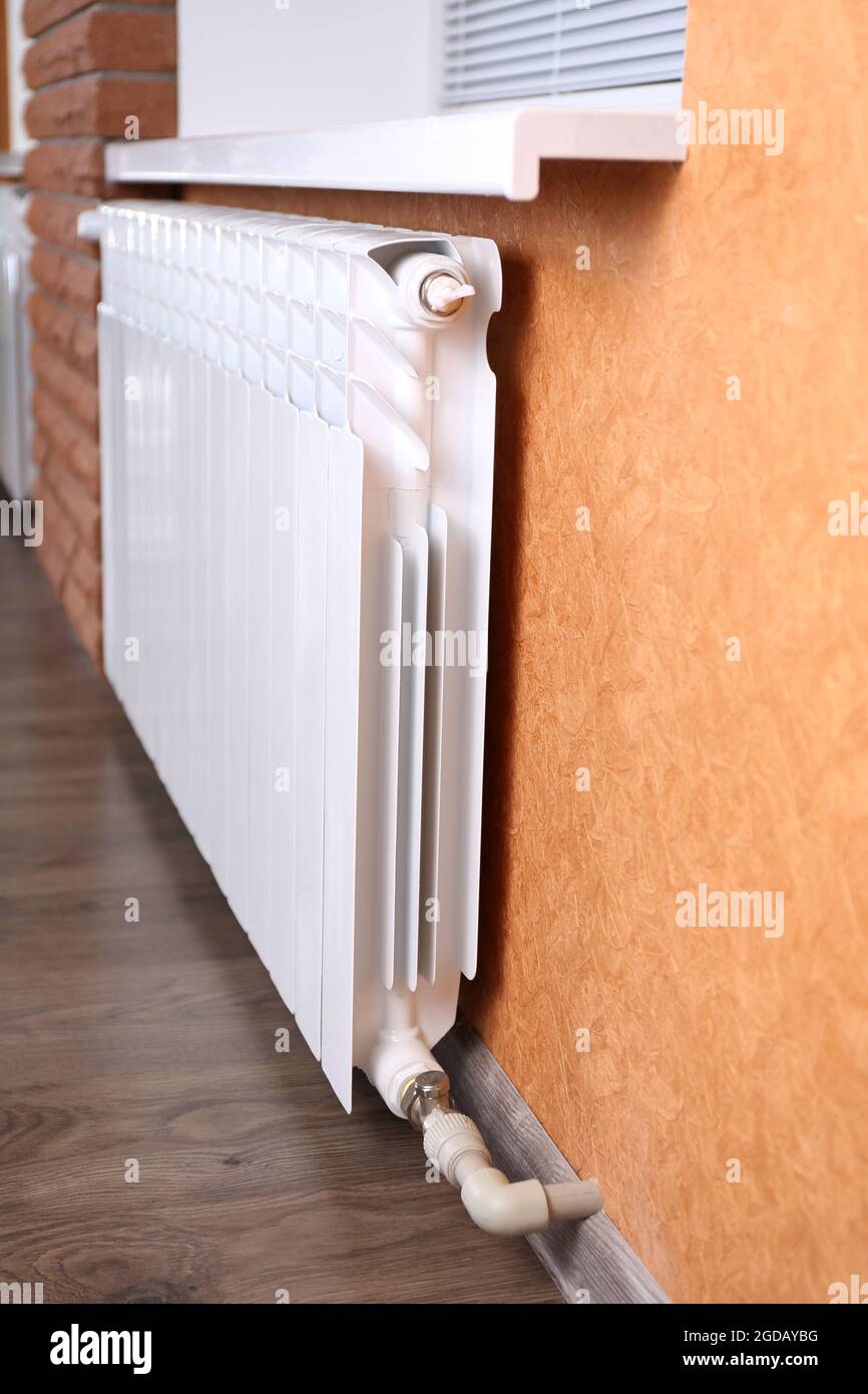Heating radiator in room Stock Photo Alamy