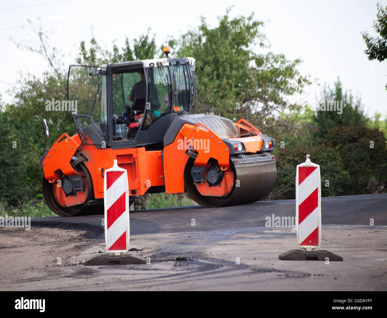 Shallow DOF road works restraints. Unfocused reflective paint sign ...