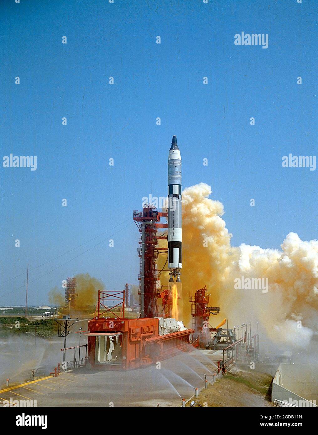 Gemini-Titan 4 (GT-4) lift-off carrying James McDivitt and Ed White for a four-day mission. This flight included the first spacewalk by an American astronaut, performed by Ed White. Stock Photo