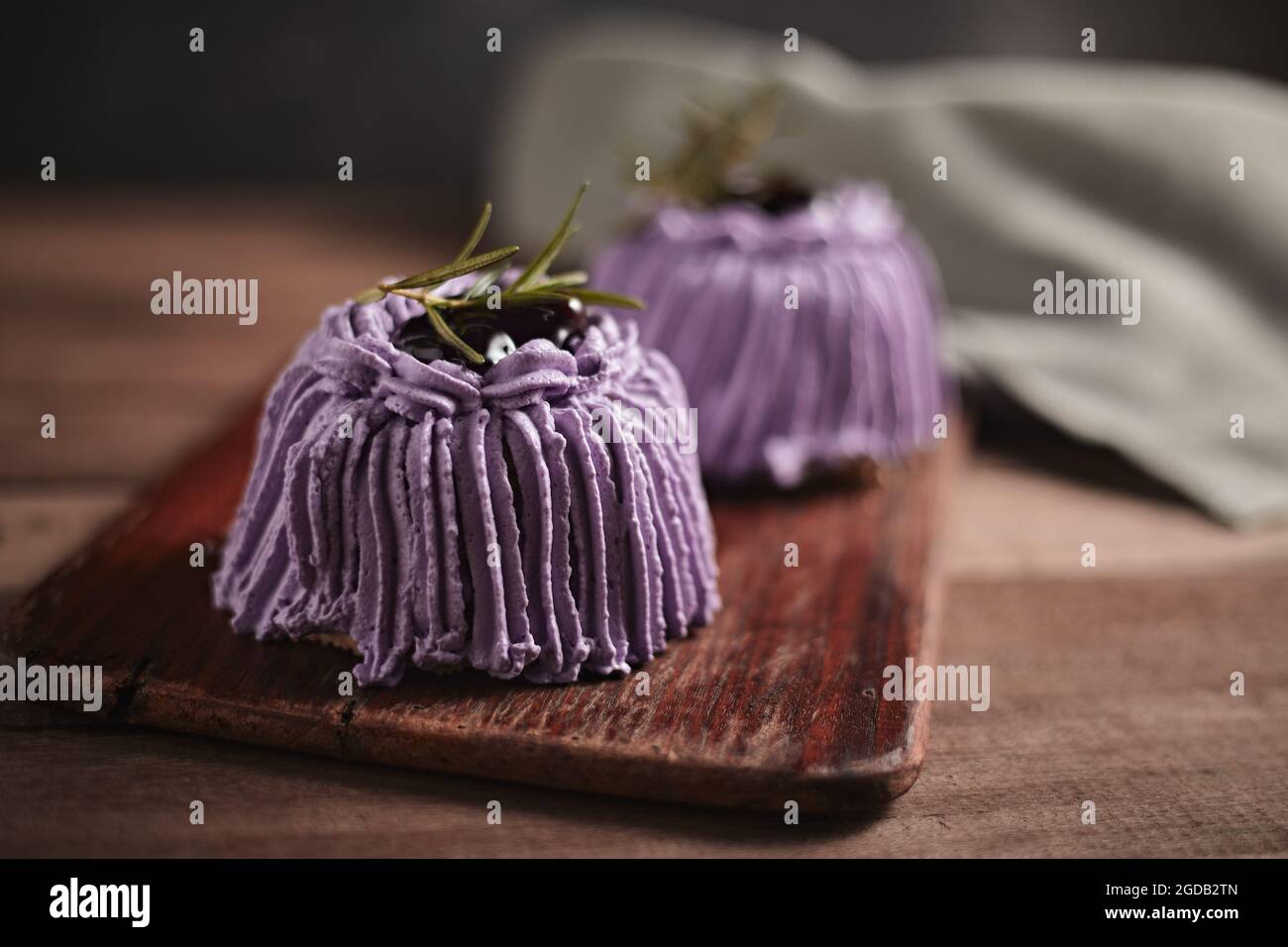 Yummy sweet Blueberry cake with Blueberry toping Stock Photo