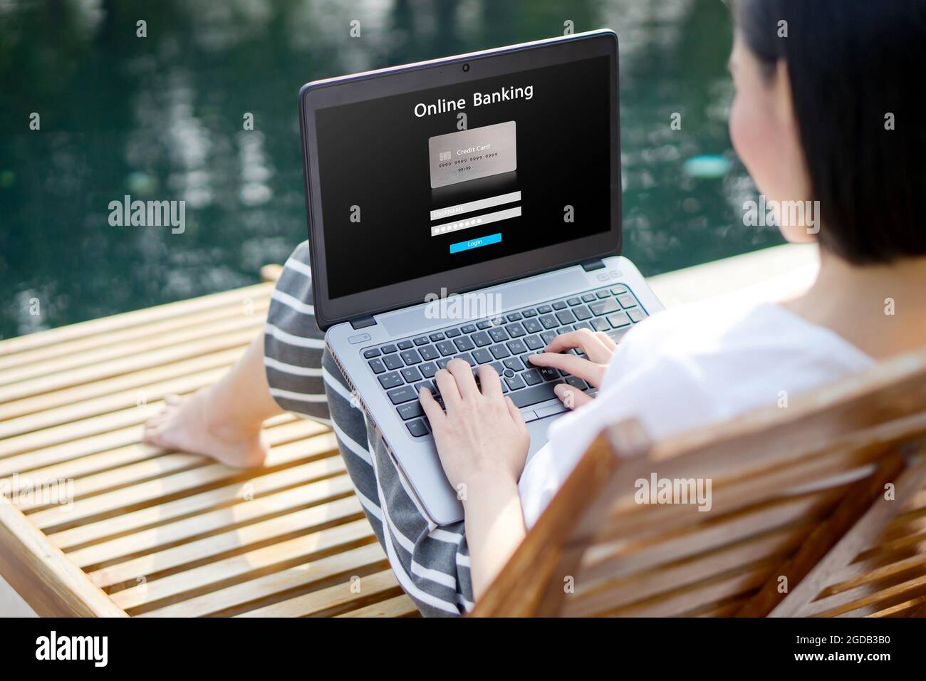 Woman touching online bank hi res - Woman Use Online Banking Concept 2GDB3B0