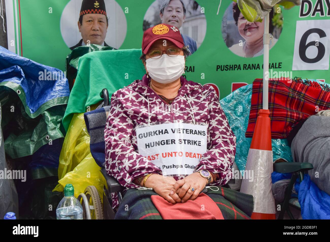 London, United Kingdom. 12th Aug, 2021. Gurkha veteran Pushpa Rana Ghale on day 6 of her hunger strike. Gurkha army veterans have been staging a hunger strike outside Downing Street in protest against 'discrimination, exploitation, and historic injustice', as well as unequal pensions given to Gurkha soldiers compared to their British counterparts. (Credit: Vuk Valcic/Alamy Live News) Stock Photo