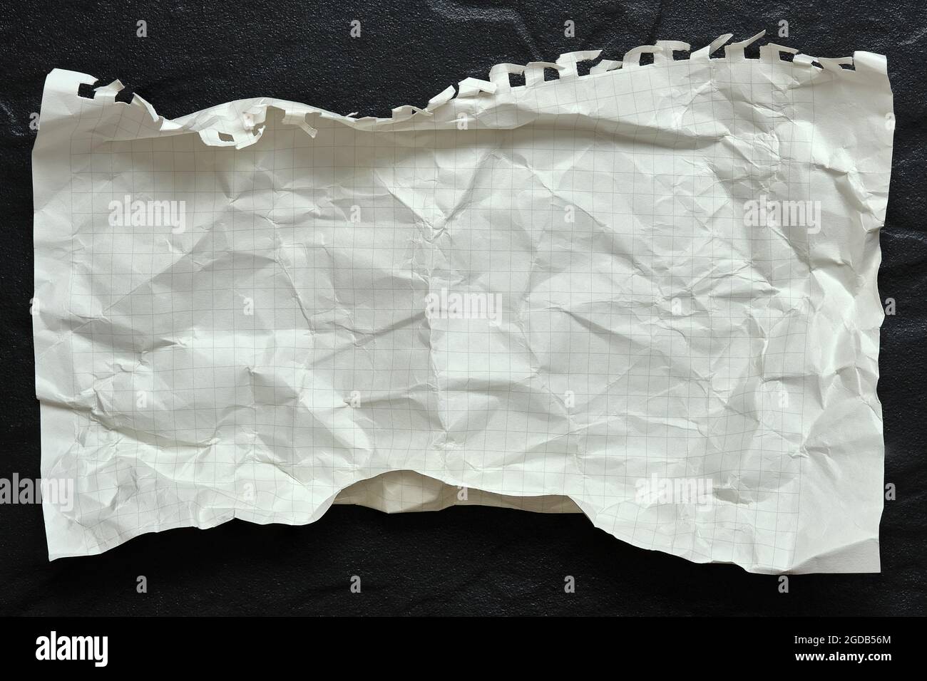 Crumpled Graph Paper Texture, Creased Paper on Black Background, Copy