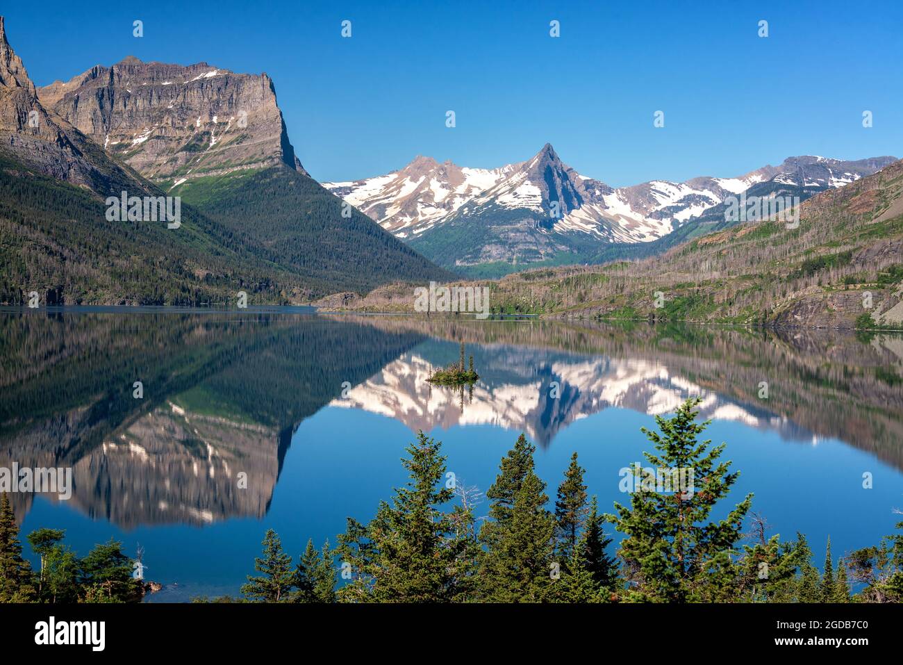 Landscape and reflection of Wild Goose Island in Glacier National Park Stock Photo