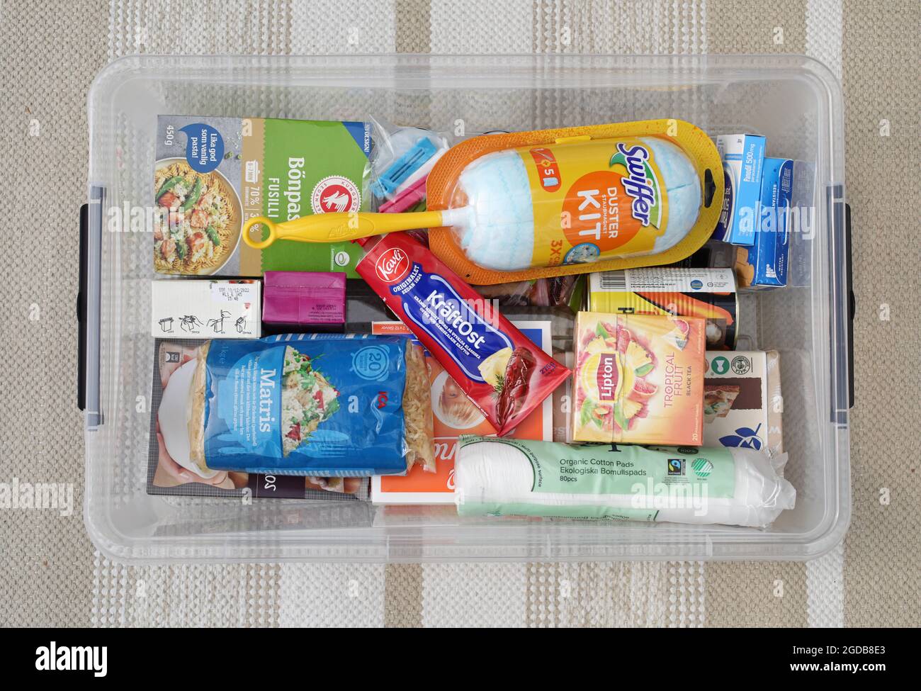 A box of food and other things when a young person moves away from home. Stock Photo