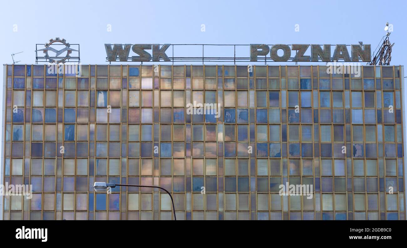 Poznan, POLAND - Jul 30, 2021: T Logo, Automotive Equipment plants WSK, founded in 1918. Automotive. Old office. Stock Photo