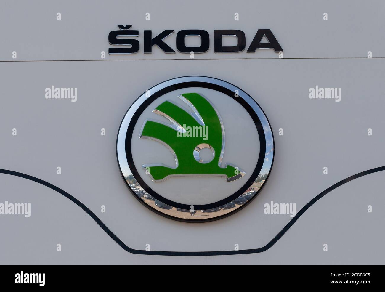 Poznan, POLAND - Jul 30, 2021: Skoda dealership sign shop logo front of store showroom Czech automobile manufacturer. Stock Photo