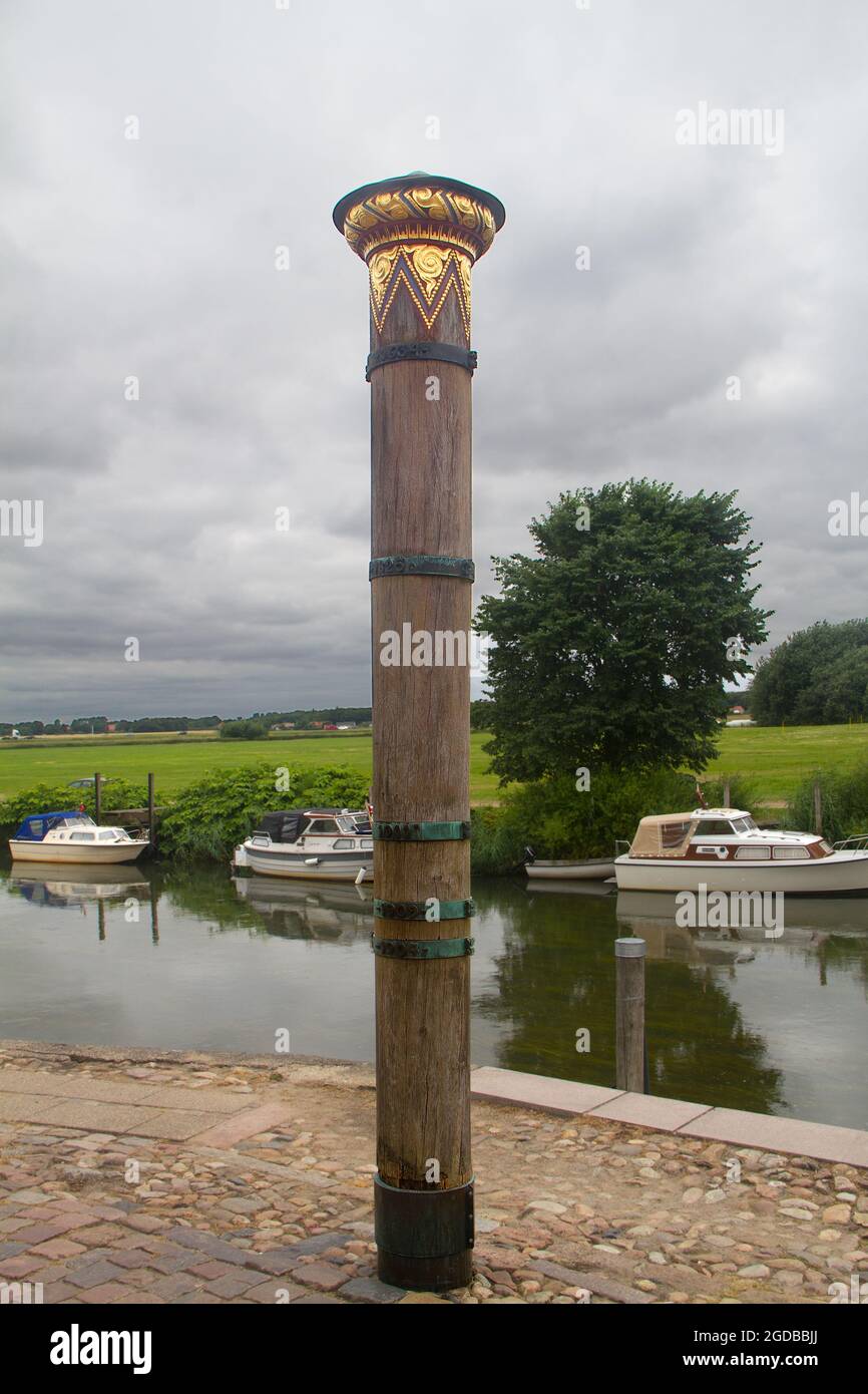 The Storm Surge Pole, Ribe, Denmark, metal rings marking the levels reached by previous floods Stock Photo