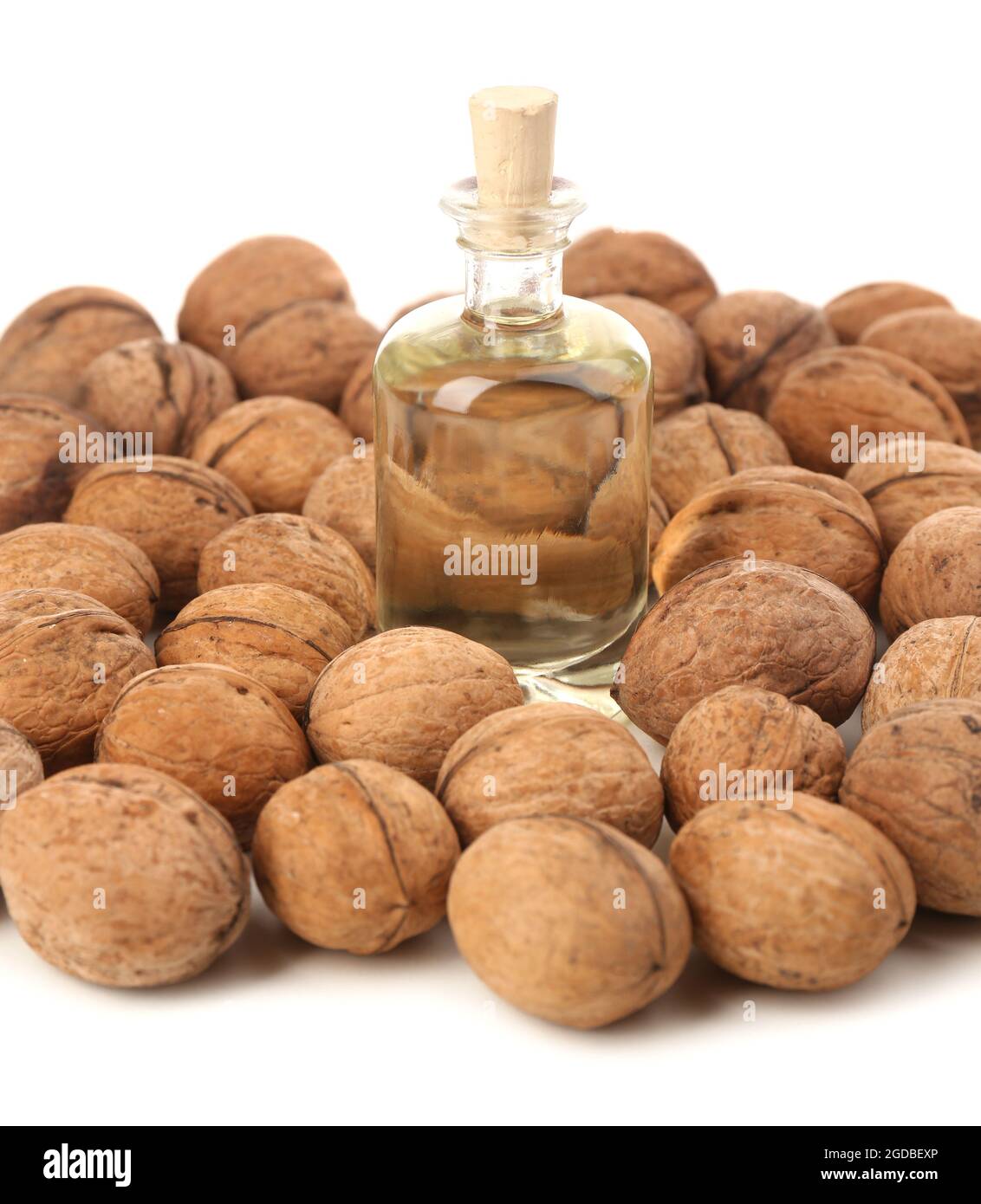 Walnut oil and nuts, isolated on white Stock Photo Alamy
