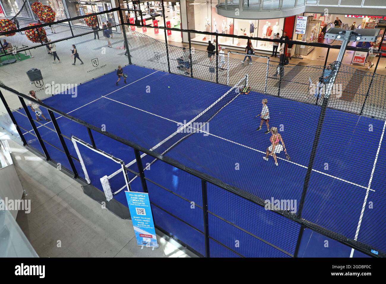 Some who play paddle tennis on a paddle tennis court in the shopping center  Nordstan, Gothenburg Stock Photo - Alamy