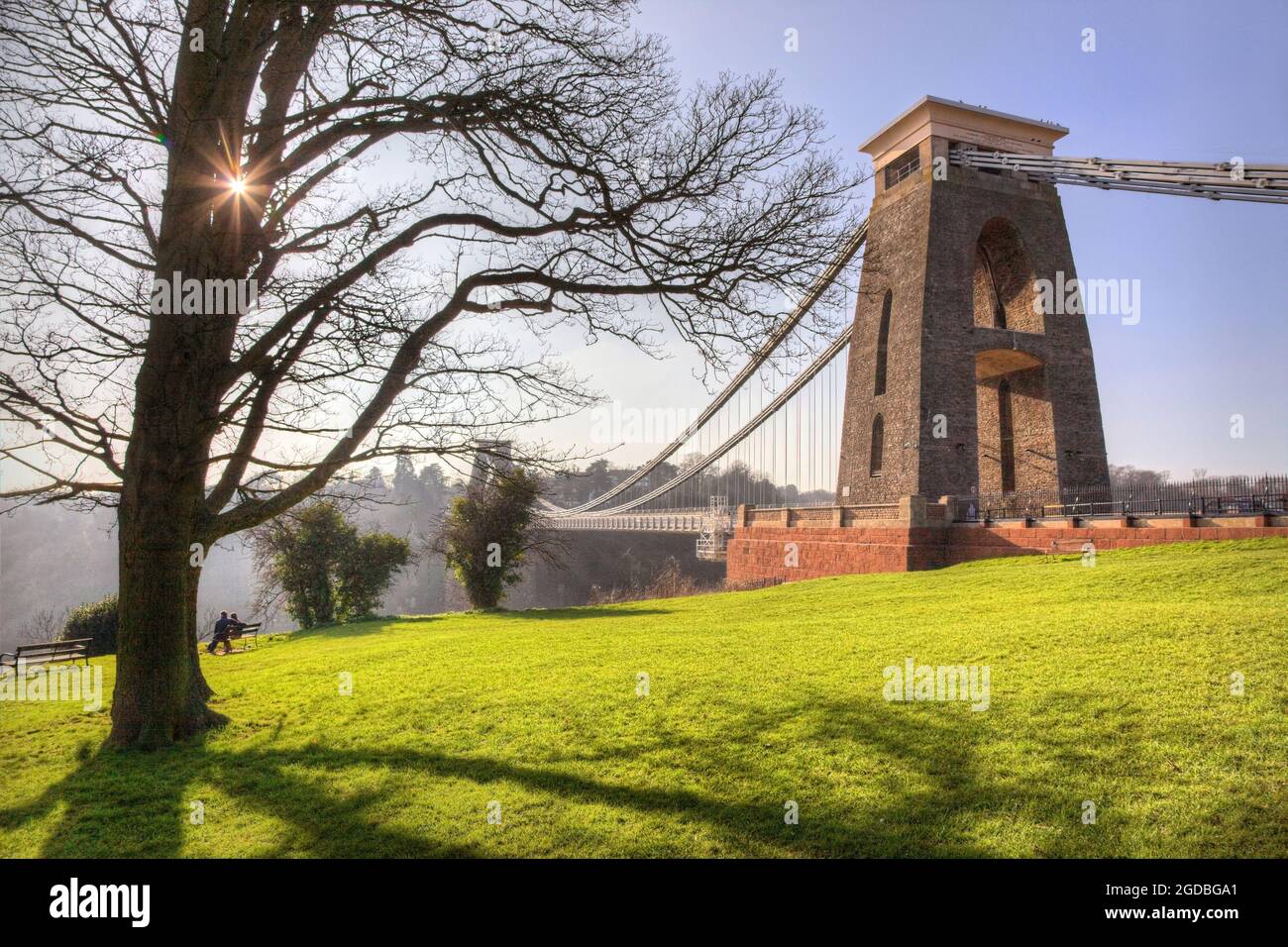 Clifton Suspension Bridge surrounded by a park under the sunlight in Bristol, the UK Stock Photo
