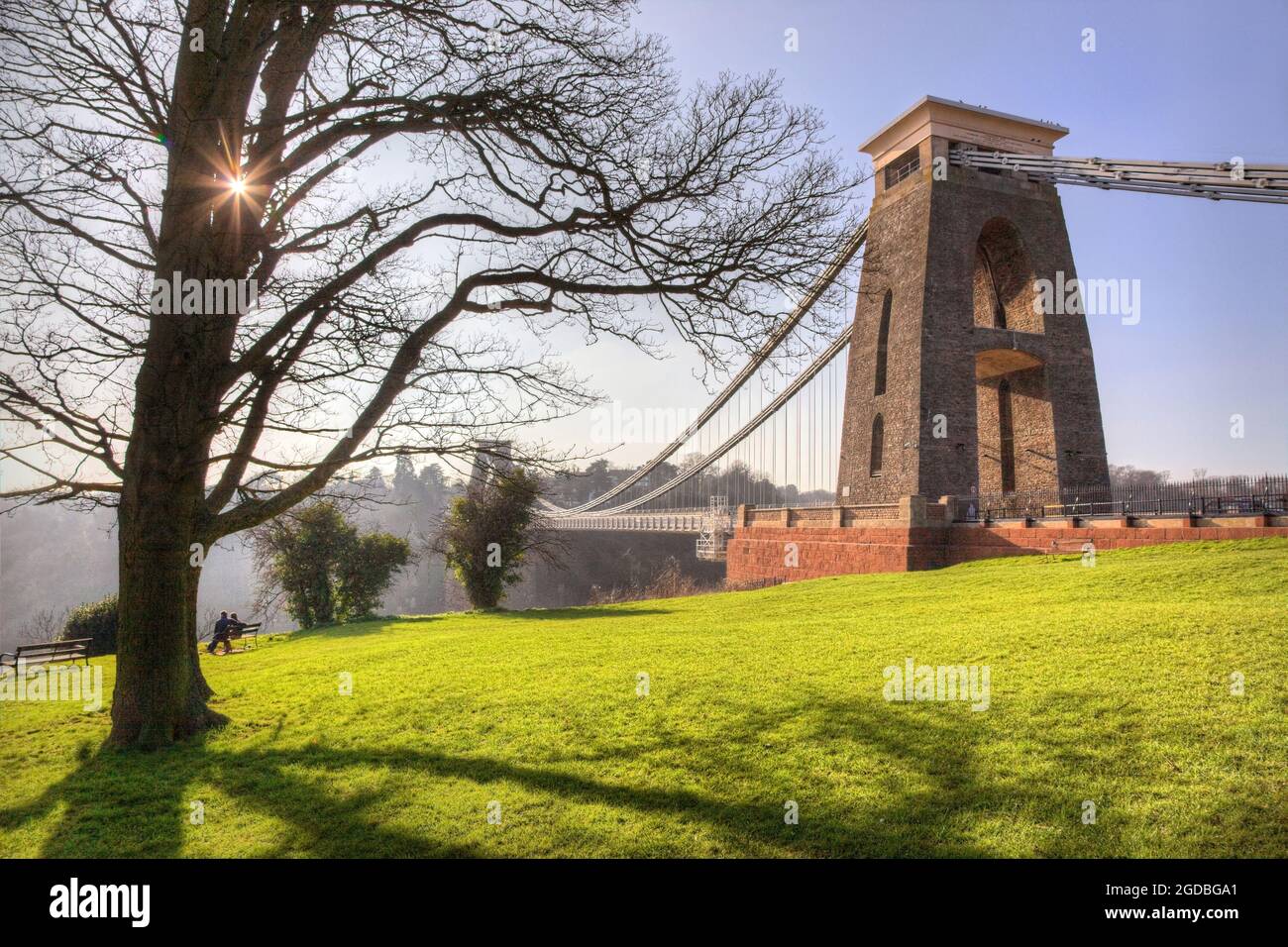Clifton Suspension Bridge surrounded by a park under the sunlight in ...