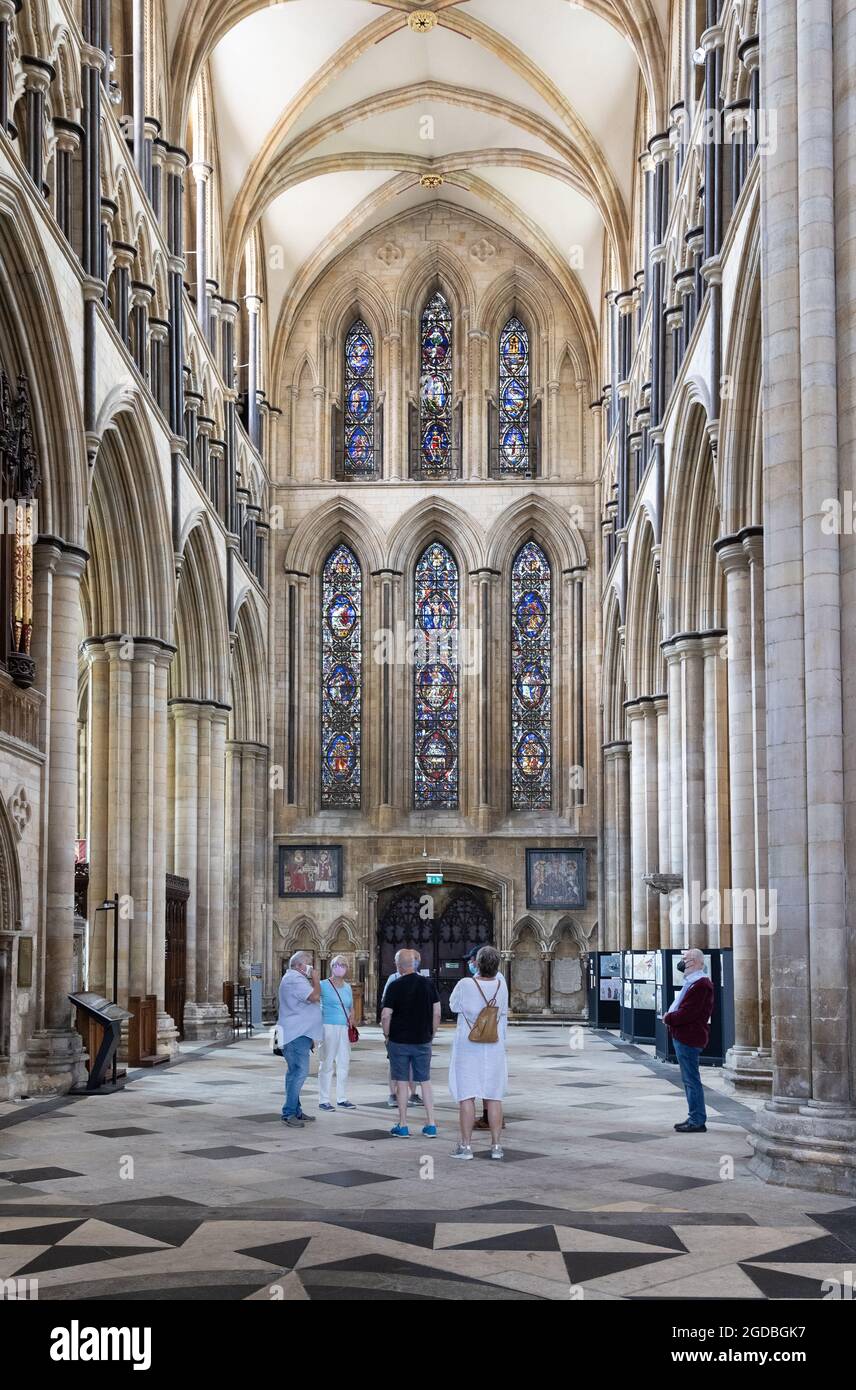 Beverley Minster interior; People in the South transept, Beverley Minster parish church, Beverley, Yorkshire UK Stock Photo