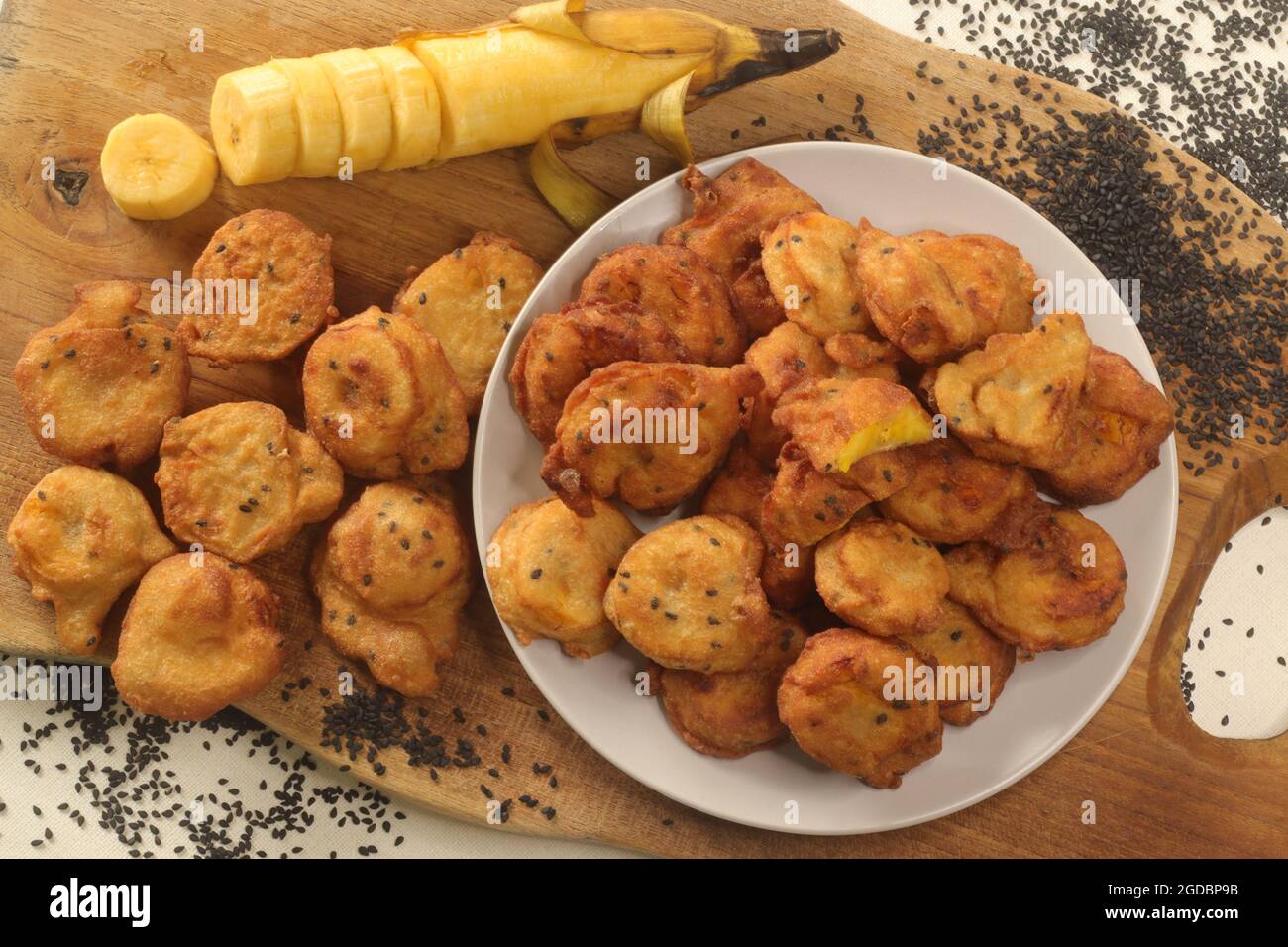 Plantain fritters. Plantain slices dipped in whole wheat flour batter