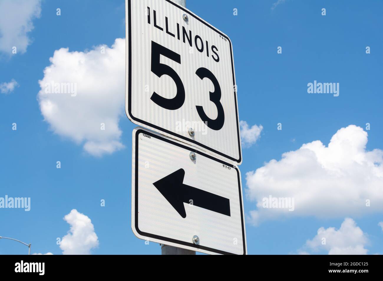 Illinois Route 53 street sign with blue skies and clouds in the background. Stock Photo